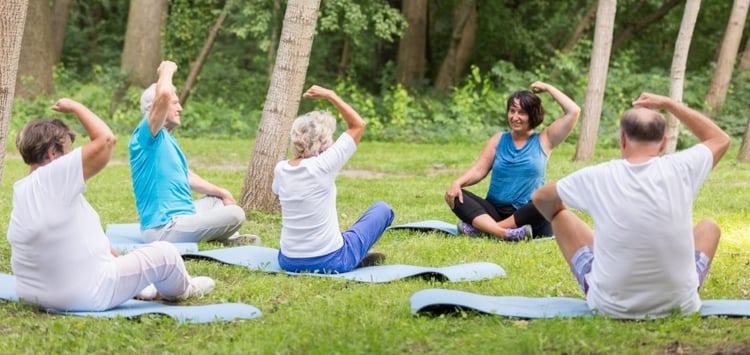 active-grandparents-excercising-in-the-garden-PYDGFBA-377910-edited.jpg